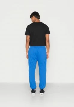 MENNACE ESSENTIAL JOGGER UNISEX - Jogginghose - Blue -Mennace Speichern 6d79c7c360b84b62b749285d17c77056