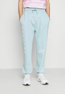 MENNACE SUNDAZE FACE - Jogginghose - Light Blue, Unisex