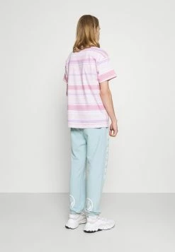 MENNACE SUNDAZE FACE - Jogginghose - Light Blue, Unisex -Mennace Speichern 73df8861a36944b59e41d1949a5e5faa