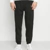 Mennace ESSENTIAL REGULAR JOGGER UNISEX - Jogginghose - Black