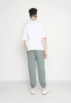 MENNACE ESSENTIAL REGULAR UNISEX - Jogginghose - Teal -Mennace Speichern 9286601fd57947148c28722254d53c87