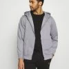 Mennace ESSENTIAL RELAXED ZIP TRHOUGH HOODIE UNISEX - Sweatjacke - Grey